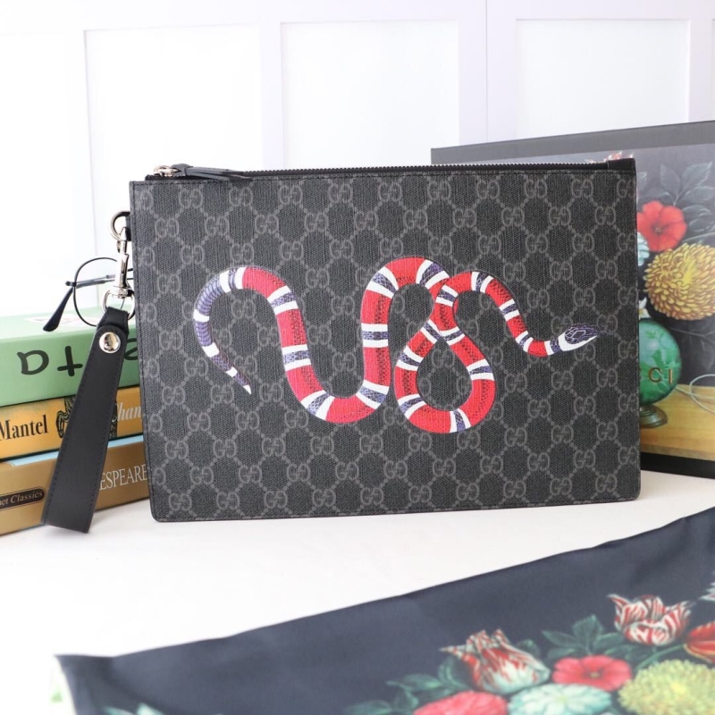 G*u*i clutch bags